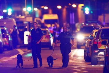 Police officers attend to the scene after a vehicle collided with pedestrians in the Finsbury Park neighbourhood of North London, Britain June 19, 2017. (Reuters)