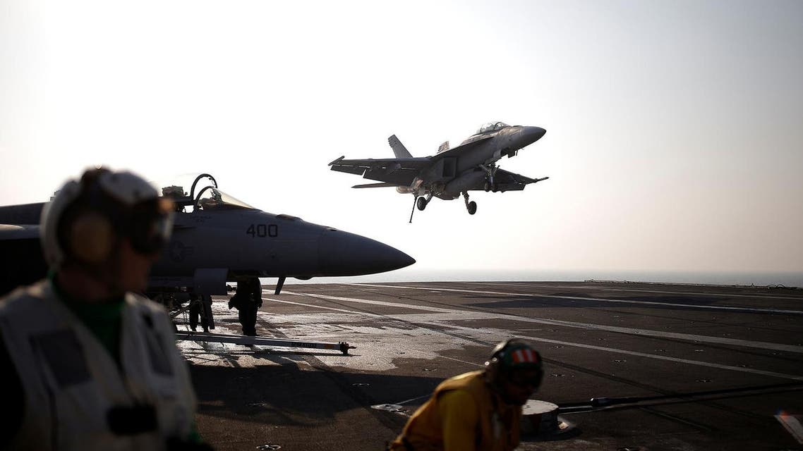 A U.S. Navy F/A-18 Super Hornet fighter lands onto the deck of the USS Ronald Reagan, a Nimitz-class nuclear-powered super carrier, during a joint naval drill between South Korea and the U.S., in the West Sea, South Korea, October 14, 2016.