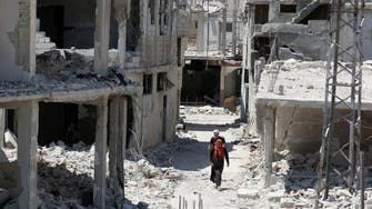 Air strikes pound southwest Syrian city of Deraa