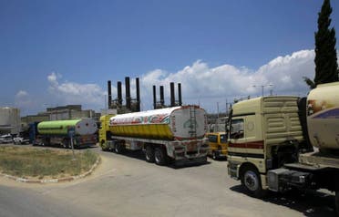Egyptian trucks carrying fuel enter Gaza's power plant in Nusseirat, in the central Gaza Strip, Wednesday, June 21, 2017. (AP)