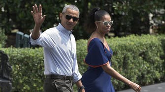 Obamas sign deal to produce podcasts for Spotify 