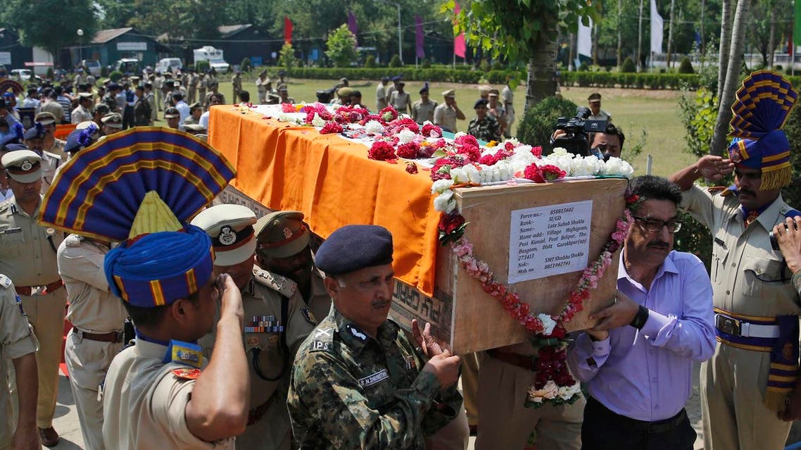 Indian paramilitary officers carry the coffin of slain officer Shab Shukla during a wreath laying ceremony on the outskirts of Srinagar, India, Sunday, June. 25, 2017. (AP)