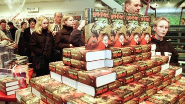 At 8 am customers stand in line at a bookstore in Bremen, northwest Germany, to buy the forth title of Scotish novelist J.K. Rowling's Harry Potter books on Saturday, October 14, 2000. (AP)