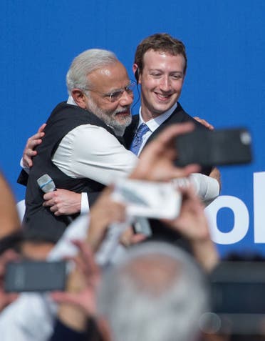 Narendra Modi and Facebook CEO Mark Zuckerberg hug after a Townhall meeting, at Facebook headquarters in Menlo Park, California, on September 27, 2015. (AFP)