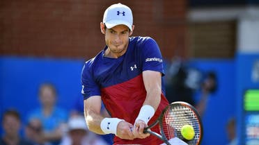 Britain's Andy Murray returns to Australia's Jordan Thompson during their men's singles first round tennis match at the ATP Aegon Championships tennis tournament at Queen's Club in west London on June 20, 2017. Murray lost the match 6-7, 2-6. (AFP)