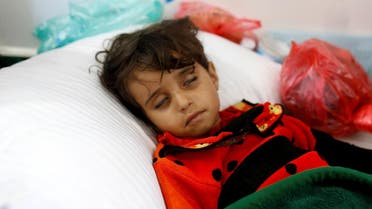 A girl infected with cholera lies on the ground at a hospital in Sanaa, Yemen May 7, 2017. Picture taken May 7, 2017. REUTERS