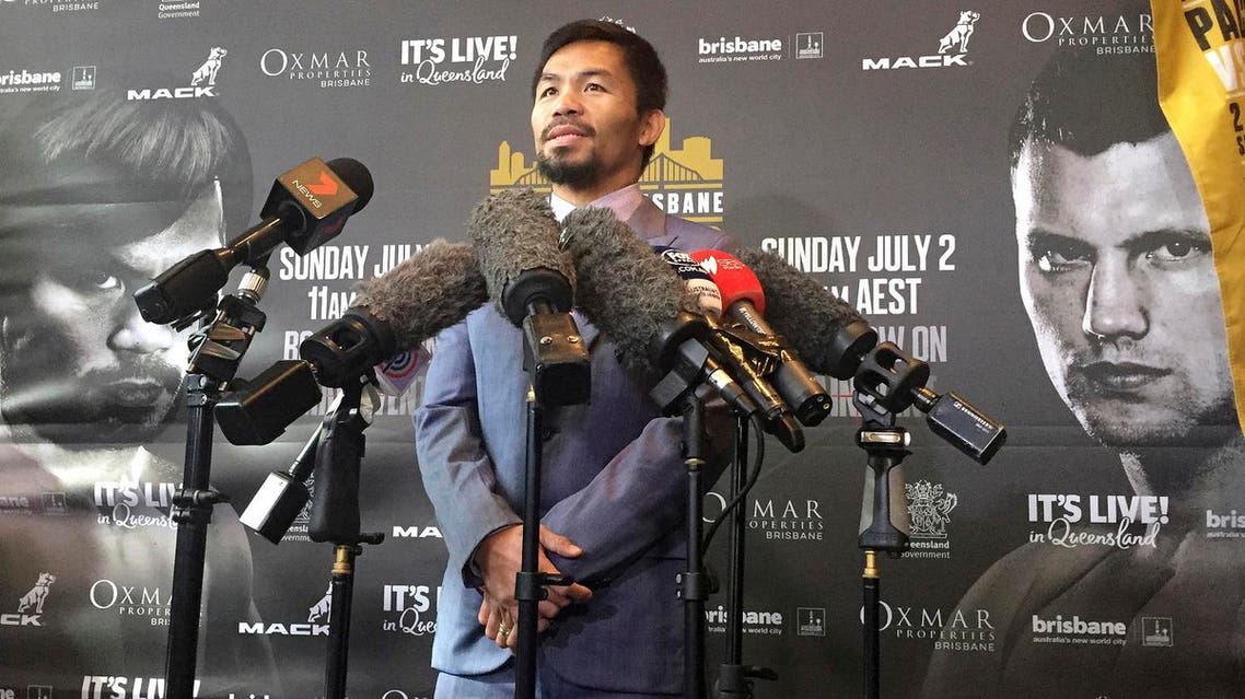 Famed boxer Manny Pacquiao of the Philippines speaks to the media during a press conference with Jeff Horn of Australia in Brisbane, Wednesday, June 28, 2017. (AP)