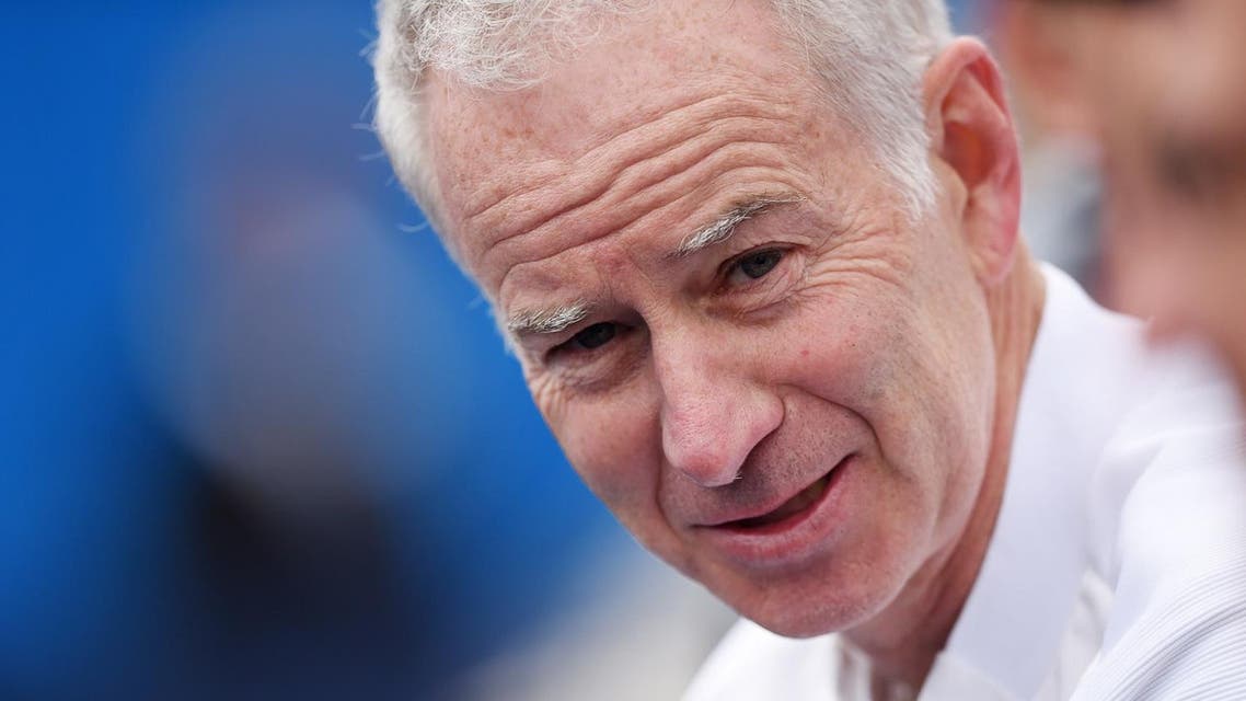 Canada's Milos Raonic coach John McEnroe during his semi final match. (Reuters)