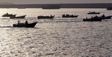 Iranian boats loaded with smuggled goods cruise through the Strait of Hormuz near Oman's Khasab port on July 14, 2012. (File photo: AFP)