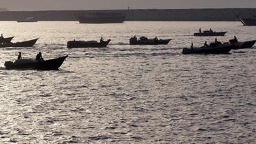 Iranian boats loaded with smuggled goods cruise through the Strait of Hormuz near Oman's Khasab port on July 14, 2012. (File photo: AFP)