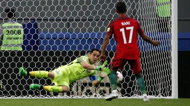 Chile’s Claudio Bravo saves from Portugal’s Nani to win the penalty shootout REUTERS