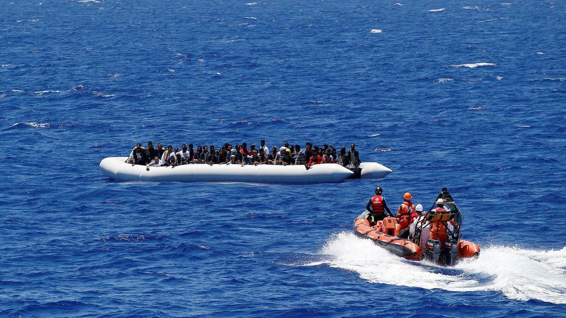 Migrants on a dinghy are rescued by "Save the Children" NGO crew from the ship Vos Hestia in the Mediterranean sea off Libya coast, June 15, 2017. REUTERS/Stefano Rellandini