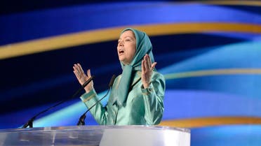 President of the National Council of Resistance of Iran (CNRI) Maryam Radjavi gestures while speaking during the National Council of Resistance of Iran (CNRI) annual meeting on July 9, 2016, in Le Bourget, near Paris. The National Council of Resistance of Iran (CNRI) drew up a statement on July 9 declaring "failure" one year after the historic Iranian nuclear program agreement, saying the country had been pushed into recession and isolated from neighbors. AFP