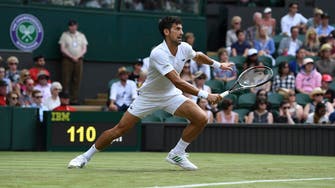 Djokovic into Wimbledon second round as Klizan retires injured