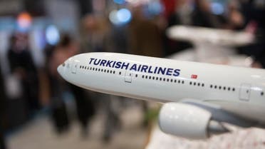 Visitors inform themselves at a stand of Turkish Airlines at the International Tourism Trade Fair (ITB) on March 8, 2017. AFP