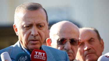 Turkey's President Tayyip Erdogan talks to media after the Eid al-Fitr prayers in Istanbul, Turkey, June 25, 2017. REUTERS/Murad Sezer