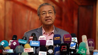 Malaysia’s opposition leader Mahathir under investigation for ‘fake news’