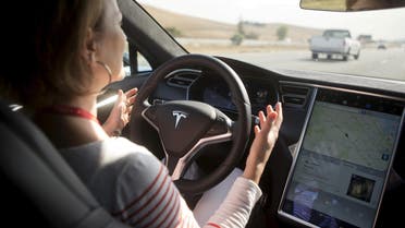 New Autopilot features are demonstrated in a Tesla Model S during a Tesla event in Palo Alto, California October 14, 2015. (Reuters)