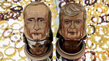 This picture taken on July 6, 2017, shows traditional Russian wooden nesting dolls, called Matryoshka dolls, depicting President Trump (R) and President Putin at a gift shop in central Moscow. (AFP)