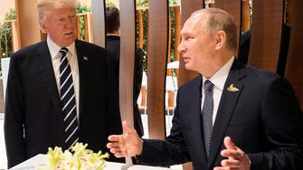 Trump confronts Putin on election hacking in first meeting