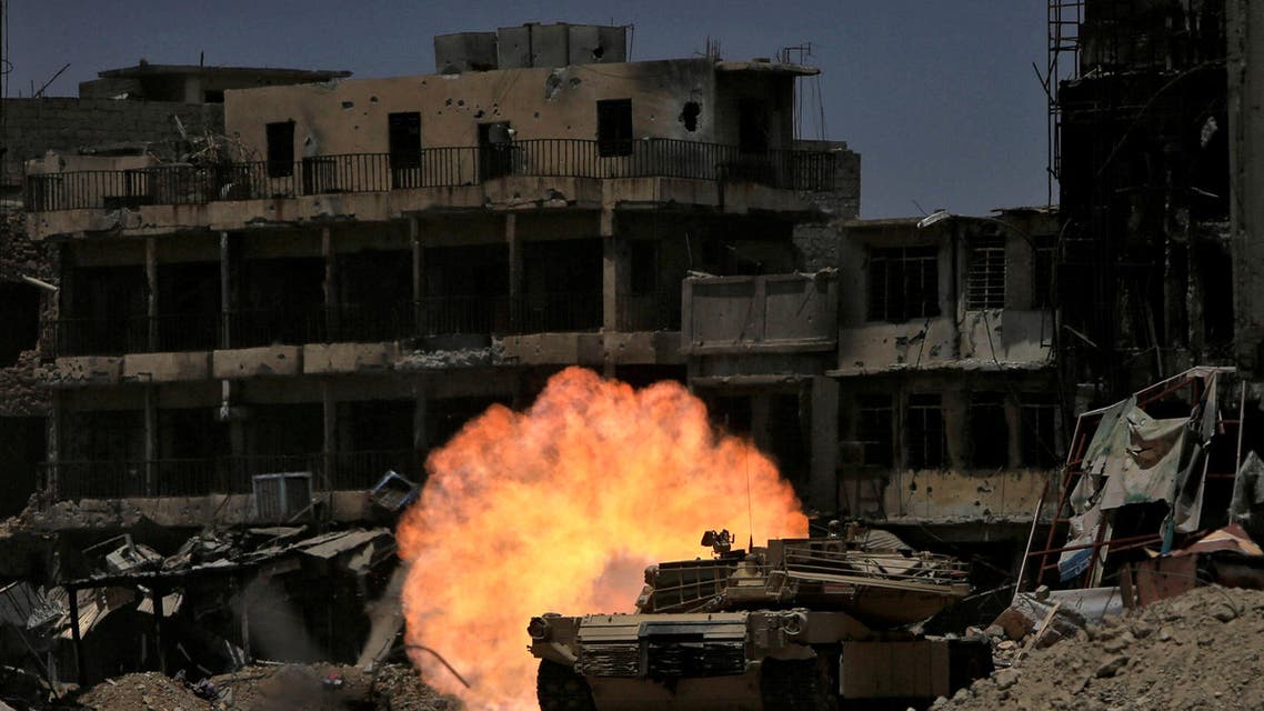 A tank of the Emergency Response Division fires at ISIS militant in the old city of Mosul, Iraq July 5, 2017. (Reuters)