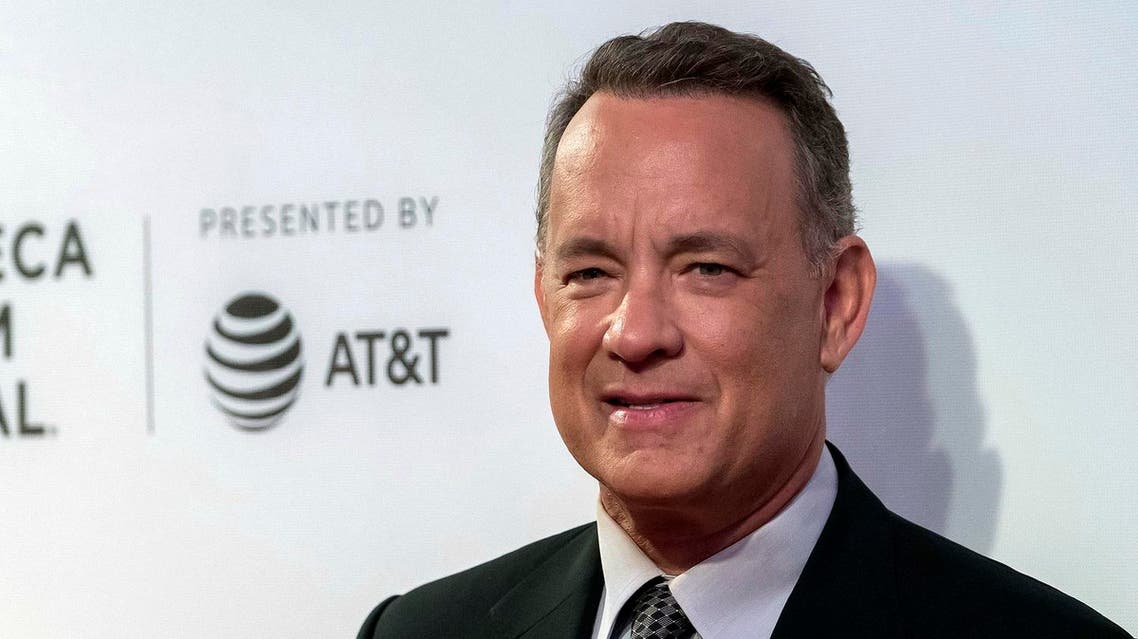 FILE - In this April 26, 2017 file photo, Tom Hanks attends "The Circle" premiere during the 2017 Tribeca Film Festival in New York. Hanks is on the beat in New York City, using Twitter Saturday, May 20, 2017, to alert police to a car with a slew of tickets on its windshield. Turns out the tickets were paid. (Photo by Charles Sykes/Invision/AP, File)