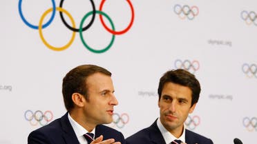 Emmanuel Macron and Tony Estanguet attend the 2024 Olympic Games’ press conference after the briefing, in Lausanne, Switzerland. (Reuters)