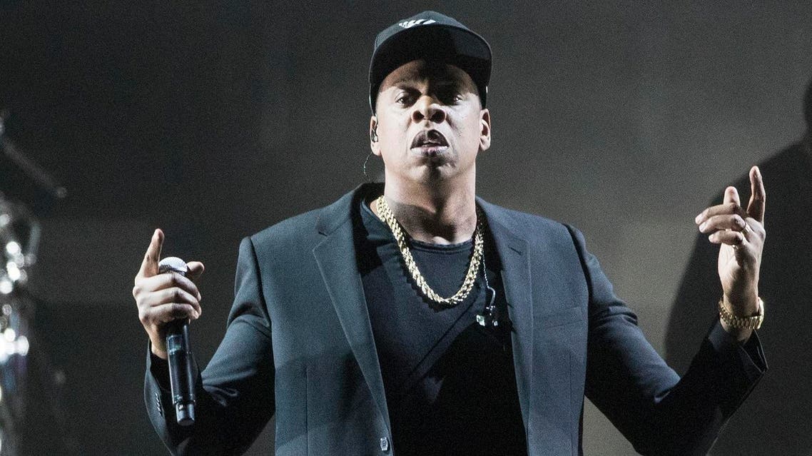 FILE - In this Nov. 4, 2016, file photo, Jay-Z performs during a campaign rally for Democratic presidential candidate Hillary Clinton in Cleveland. The rap icon announced the “4:44” tour on Monday, July 10, 2017, which kicks off Oct. 27, 2017, at the Honda Center in Anaheim, Calif. It wraps Dec. 21, 2017, at the Forum in Inglewood, Calif. (AP Photo/Matt Rourke, File)