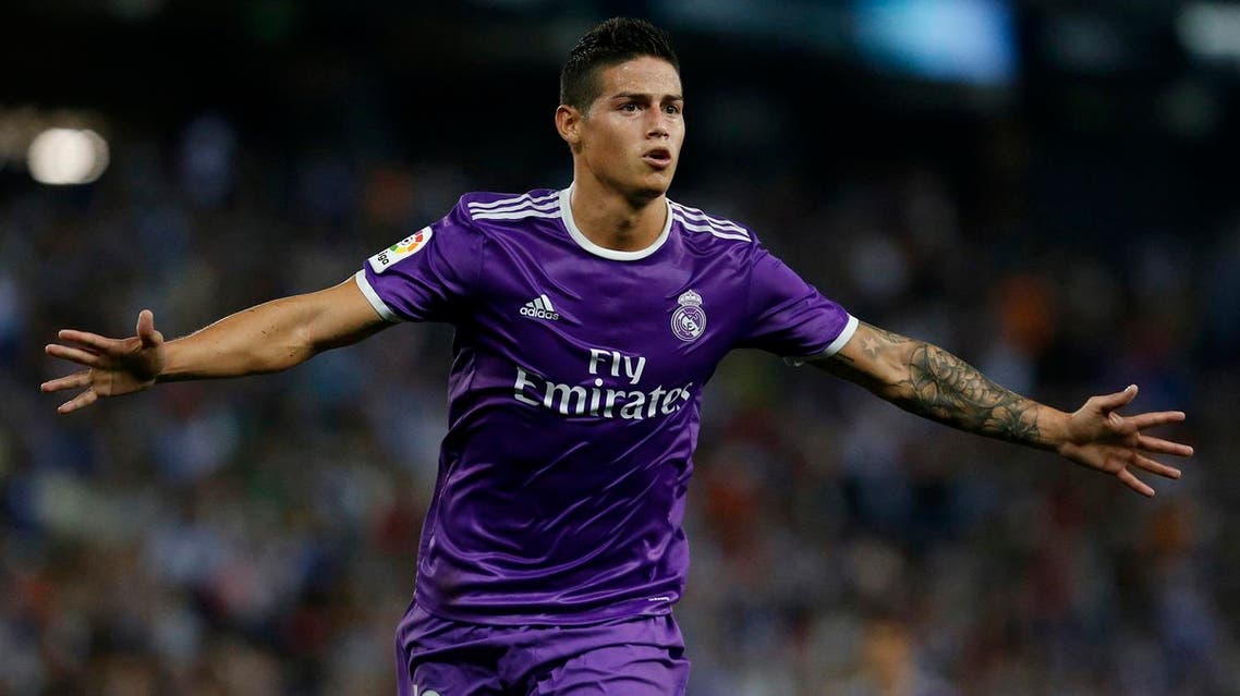 (FILES) This file photo taken on September 18, 2016 shows Real Madrid's Colombian midfielder James Rodriguez celebrating after scoring during the Spanish league football match RCD Espanyol vs Real Madrid CF at the Cornella-El Prat stadium in Cornella de Llobregat. Real Madrid's Colombian midfielder James Rodriguez will be loaned to Bayern Munich for two years, the two football clubs announced on July 11, 2017. According to the website of the German champion, the loan contract contains a call option. (AP)