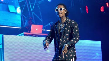 LOS ANGELES, CA - JUNE 22: Recording artist Wiz Khalifa performs onstage at night one of the 2017 BET Experience STAPLES Center Concert, sponsored by Hulu, at Staples Center on June 22, 2017 in Los Angeles, California. Bennett Raglin/Getty Images for BET/AFP 