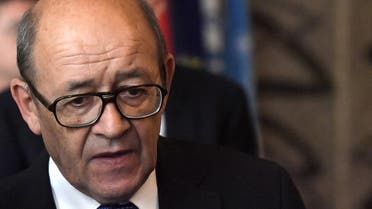 French Foreign Affairs Minister Jean-Yves Le Drian looks on as he leaves following a (AFP)