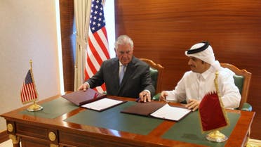 Qatar's foreign minister Sheikh Mohammed bin Abdulrahman al-Thani (R) and U.S. Secretary of State Rex Tillerson sign a memorandum of understanding in Doha, Qatar, July 11, 2017. (Reuters) 