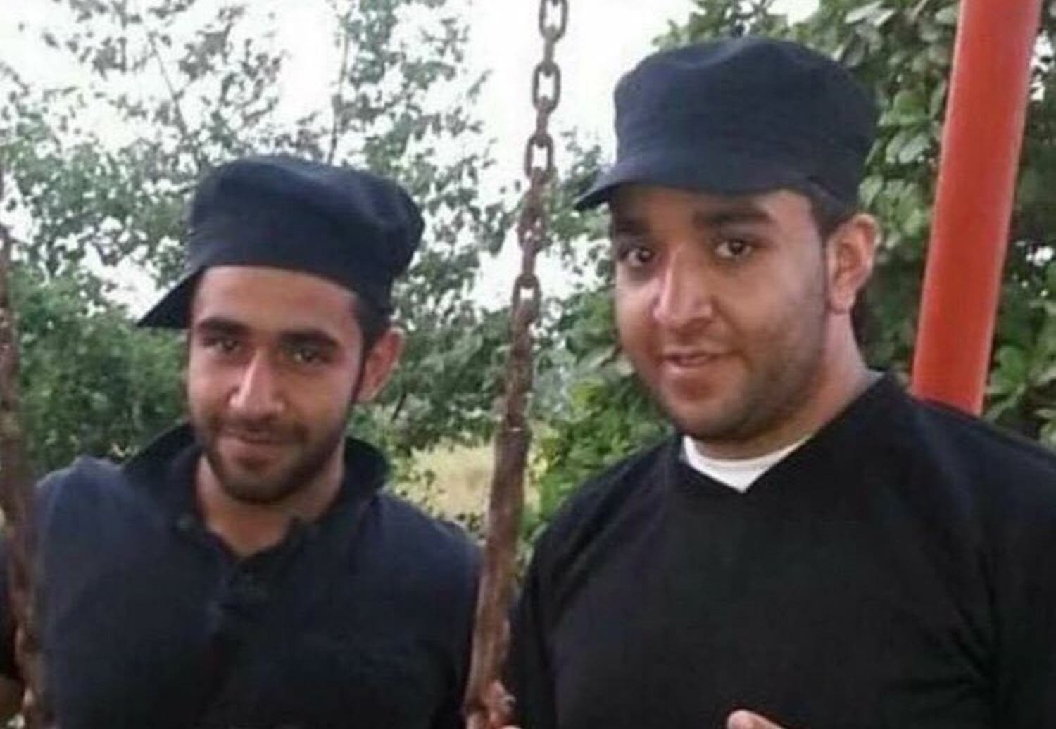 Hassan al-Abdullah with his uncle Salman al-Faraj who escaped during the farm house raid. (Supplied)