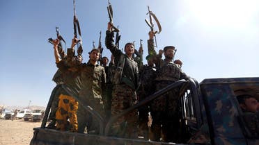 Newly recruited Houthi fighters chant slogans as they ride a military vehicle during a gathering in the capital Sanaa to mobilize more fighters to battlefronts to fight pro-government forces in several Yemeni cities, on January 3, 2017. 