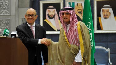French Foreign Minister Jean-Yves Le Drian (L) shakes hands with his Saudi counterpart Adel al-Jubeir (R) following a press conference in Jeddah on July 15, 2017. (AFP)