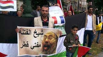 Protesters demonstrate outside Qatar’s embassy in Brussels