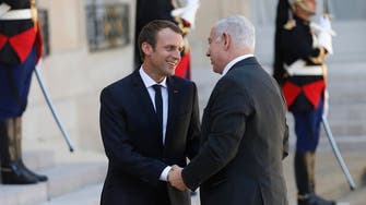 Macron urges resumption of Mideast talks based on two states