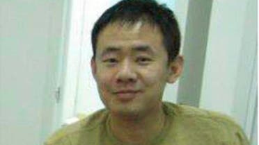 This 2009 handout photo released by a friend of Xiyue Wang shows Xiyue Wang at his apartment in Hong Kong, (AP)