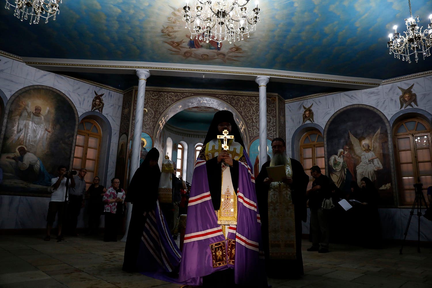 Russian-Orthodox religious figures attend the re-opening of the Sergei Compound in Jerusalem, on July 18, 2017, after six years of renovation work. (AF)
