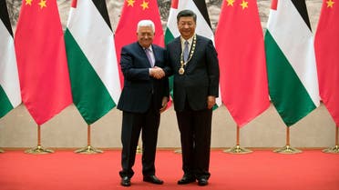 Mahmoud Abbas and Xi Jinping during a signing ceremony at the Great Hall of the People in Beijing on July 18, 2017. (AFP)