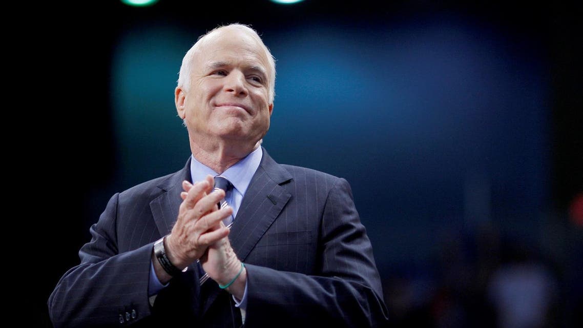 Senator John McCain listens as he is introduced at a campaign rally in Fayetteville, North Carolina, on October 28, 2008. (Reuters)