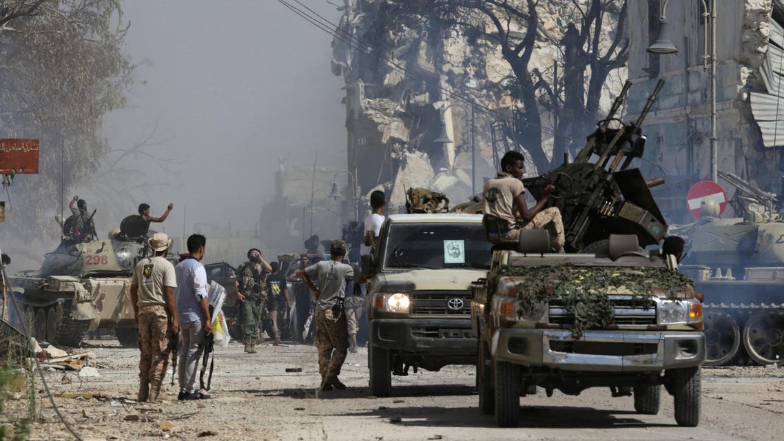 Members of Libyan National Army (LNA) gather after the liberation of Islamist militants' last stronghold in Benghazi, Libya, July 6, 2017
