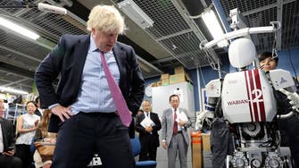When Britain’s Boris Johnson met high-tech robots in Japan