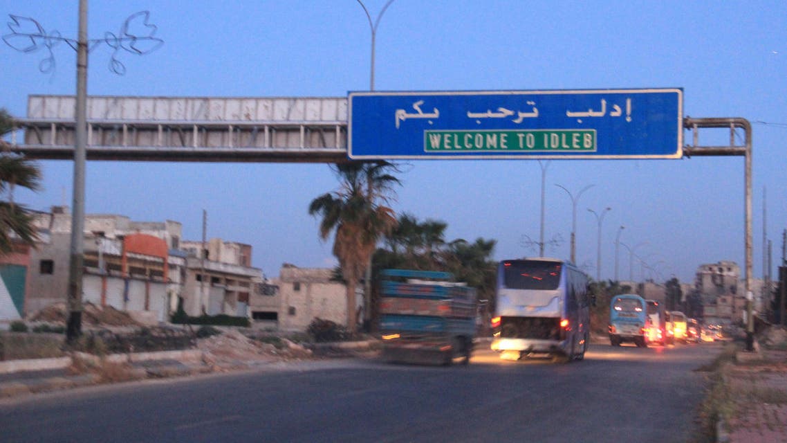 A convoy of Syrian opposition fighters and their families, who were evacuated from the Waer neighbourhood, the last opposition-held district in the central city of Homs, enters into Idlib, on May 22, 2017. The Syrian regime on May 21 regained total control of the central city of Homs with the evacuation of rebels from the last area they had controlled.