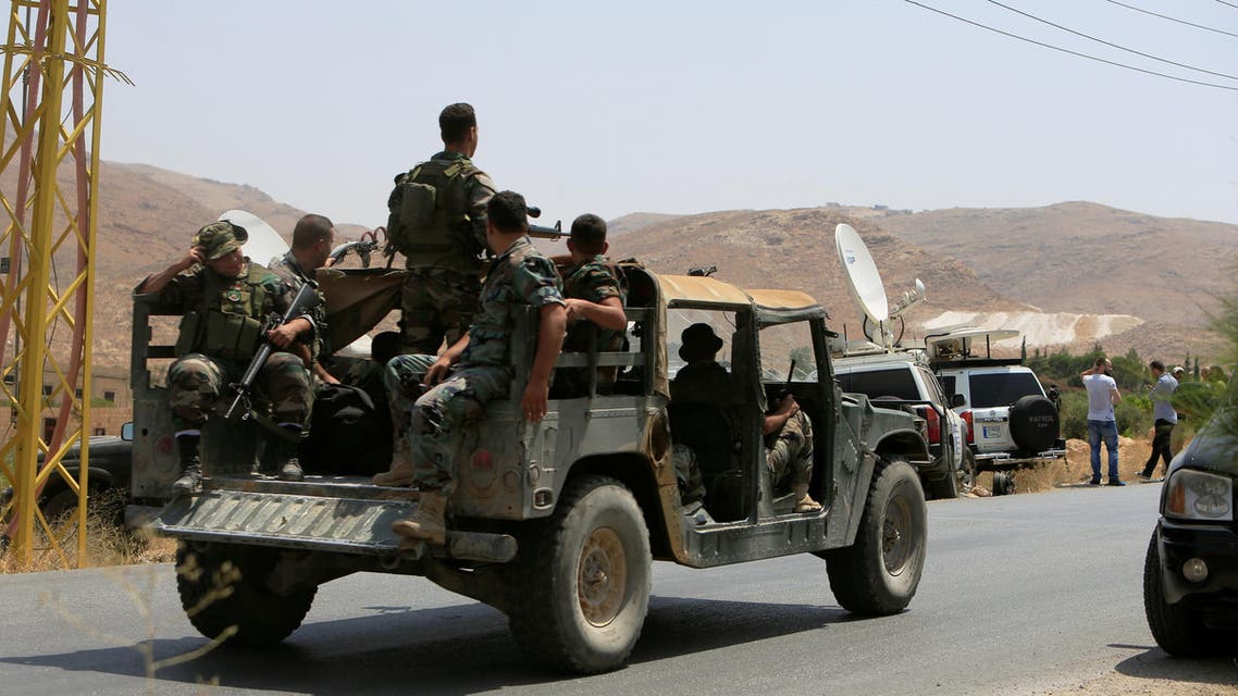 Lebanese army soldiers patrol a street in Labwe, at the entrance of the border town of Arsal, in eastern Bekaa Valley, Lebanon July 21, 2017