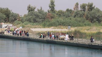 جسر عائم.. همزة الوصل الوحيدة أمام سكان الموصل