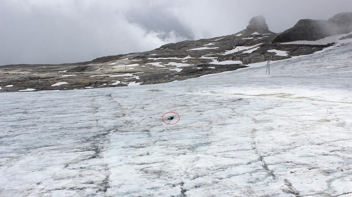 This handout picture released on July 19, 2017 by the Swiss Police of Canton Valais shows the remains of a couple found preserved in a receding glacier, near Les Diablerets. (AFP)