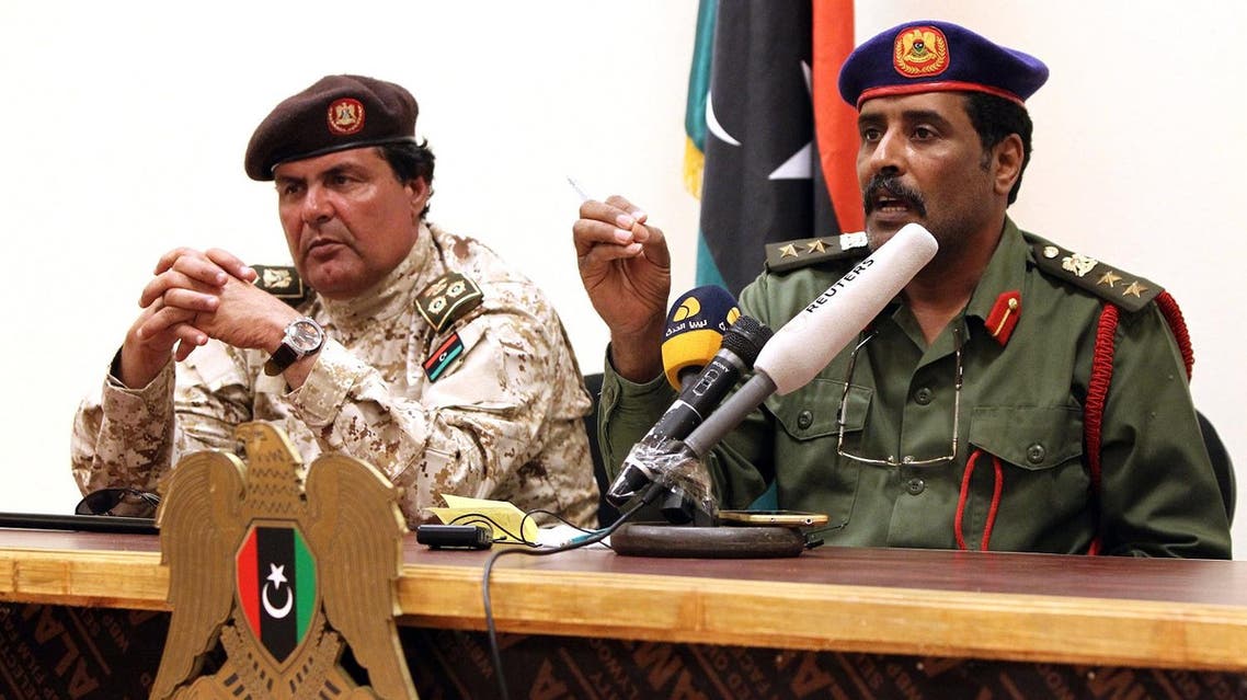 Colonel Muftah al-Muqarief (L), who heads oil guards loyal to Libyan military strongman General Khalifa Haftar Haftar, and Colonel Ahmad Mesmari, a spokesman for Haftar, hold a press conference at the Zueitina oil terminal on September 14, 2016. (AFP)