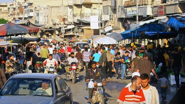 People shop during Ramadan in the rebel-held Idlib city, Syria June 8, 2017. (Reuters)