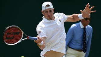 Isner achieves rarity by winning event without facing break point
